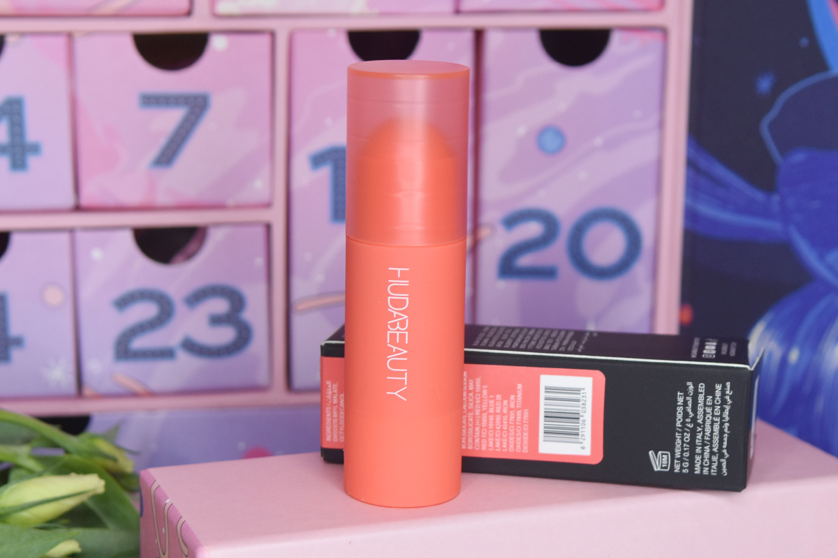 HUDA BEAUTY Cheeky Tint Blush Stick in Coral Cutie