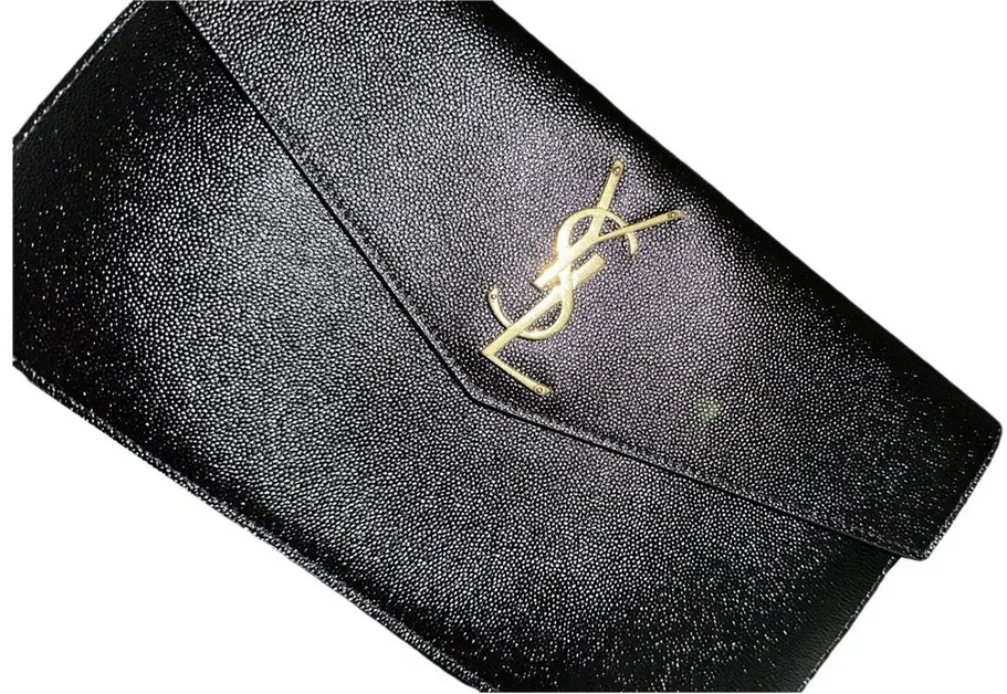 YSL leather clutch bag for £322 on Vestiaire Collective